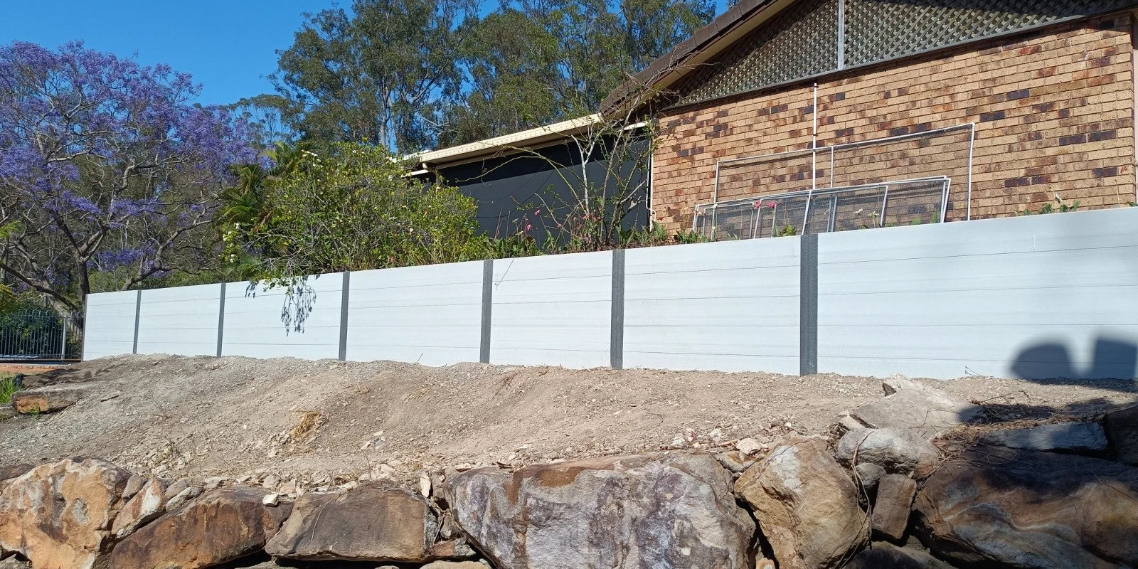 concrete-sleeper-retaining-wall-installation