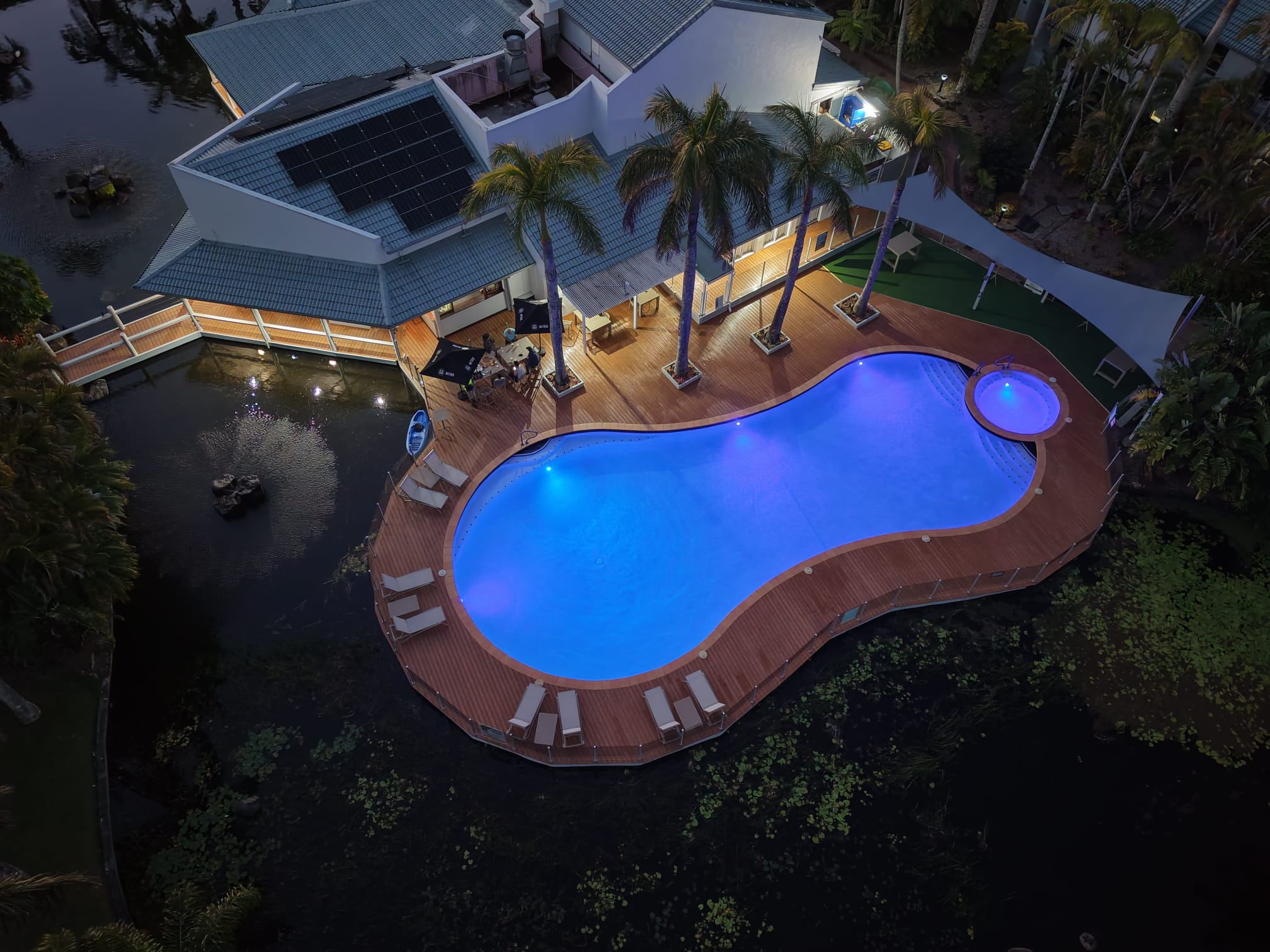 Composite decking pool surround at night